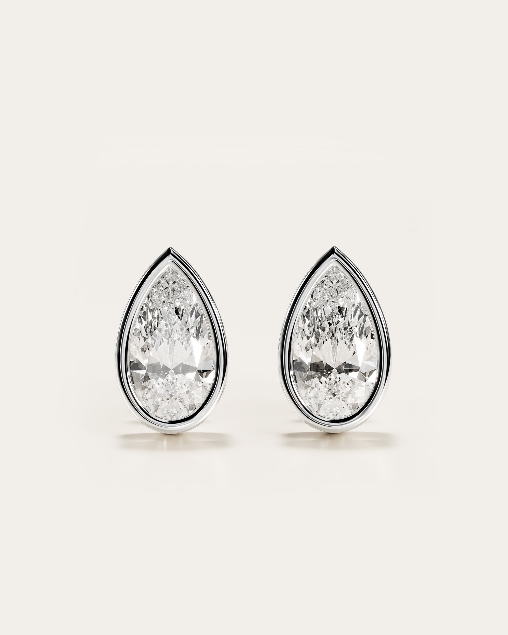 The Pear Bezel Studs